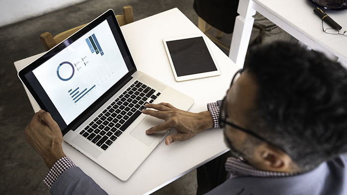 Medical professional on laptop