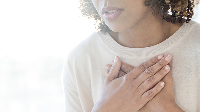 Woman experiencing atrial fibrillation