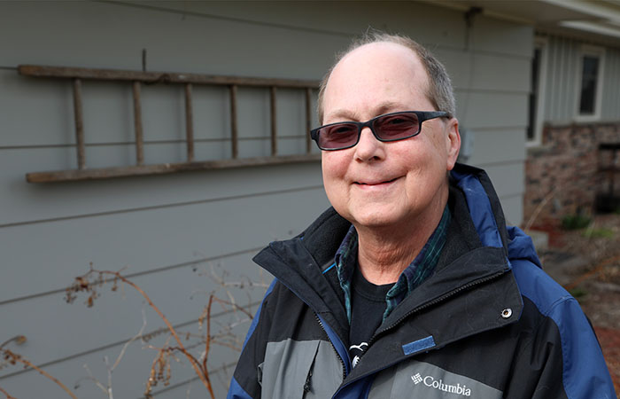 Patient Brian Pagel standing outside wearing a jacket