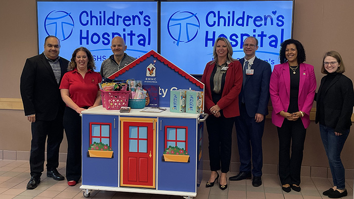 Leaders from Hospital Sisters Health System’s Central Illinois Market and Ronald McDonald House Charities of Central Illinois and its board members gather to welcome back the Ronald McDonald Hospitali