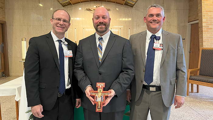 Matt Fry, Timothy Layman and Chad Markham standing