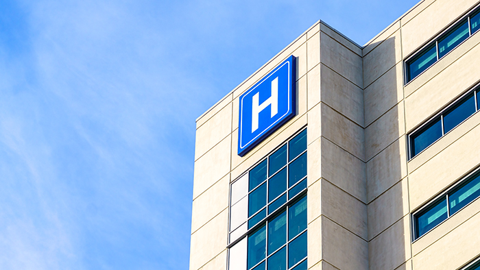 Hospital building with blue sky background