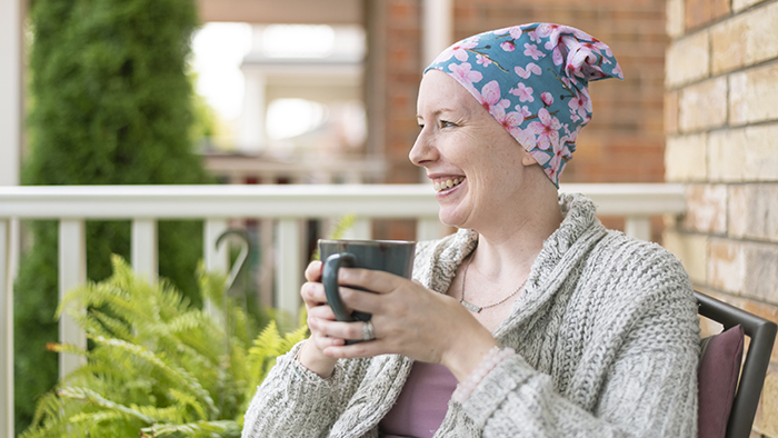 Woman in colorful bandana on her head